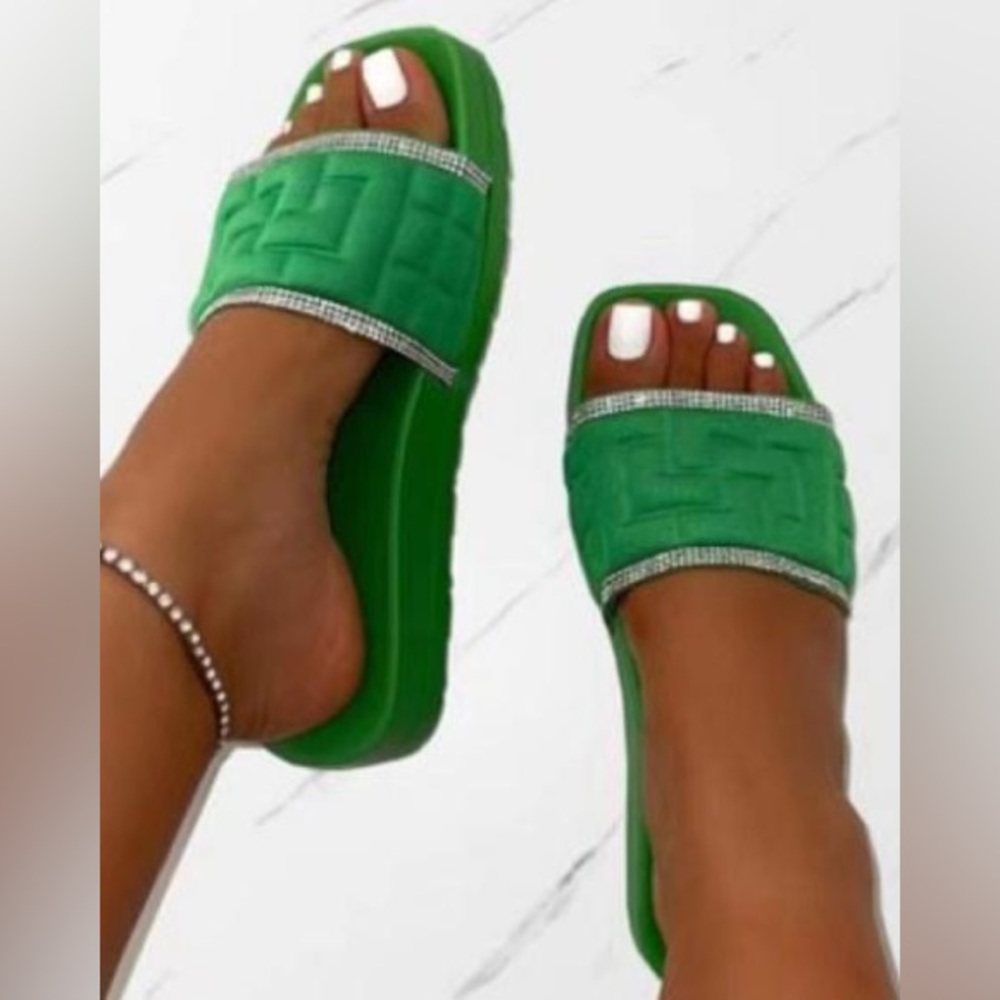 Brand New.  Green slides.